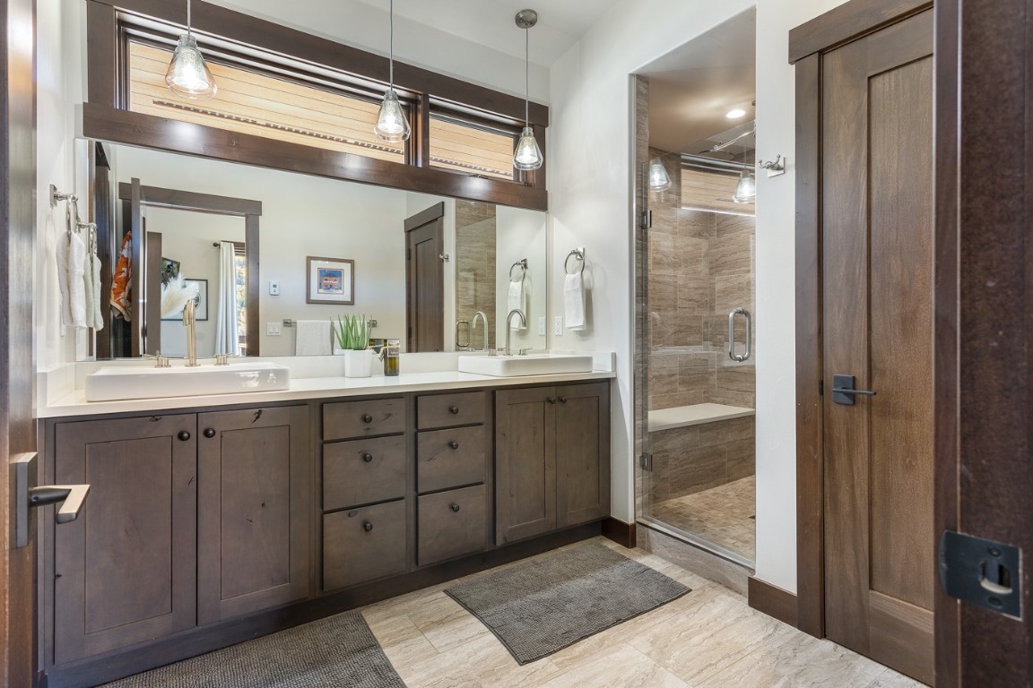 151 Moss Way Silverthorne, CO 80498 - Photo 15 of 31 a spacious bathroom with a shower and a sink