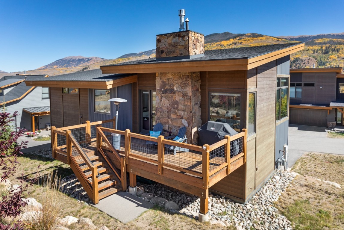 151 Moss Way Silverthorne, CO 80498 - Photo 2 of 31 a view of a patio with a table and chairs