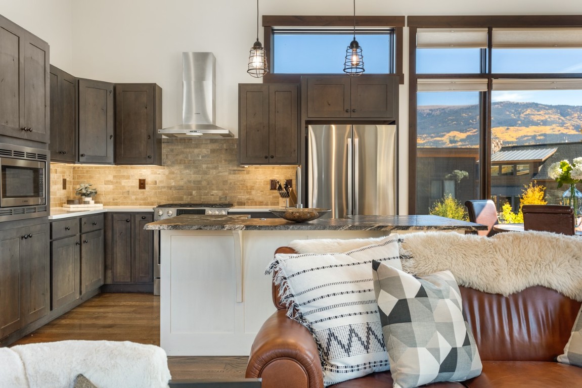 151 Moss Way Silverthorne, CO 80498 - Photo 5 of 31 a bed room with a bed furniture and a window