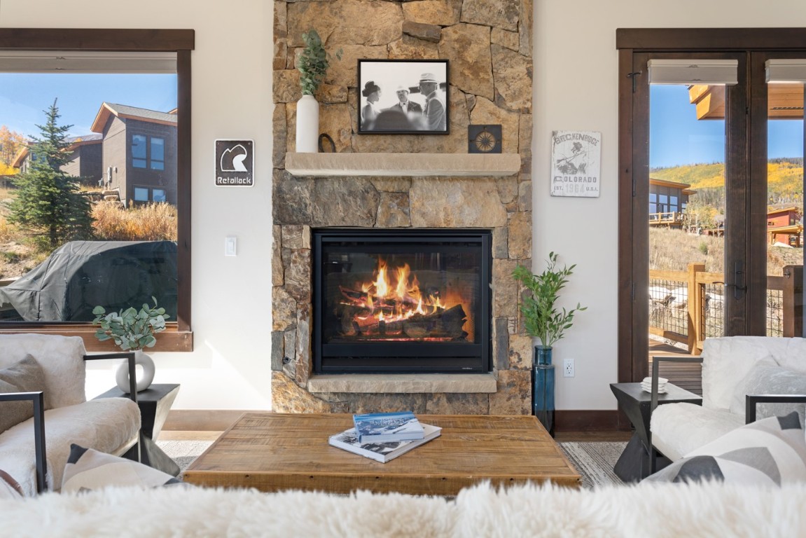 151 Moss Way Silverthorne, CO 80498 - Photo 10 of 31 a living room with furniture and a fireplace