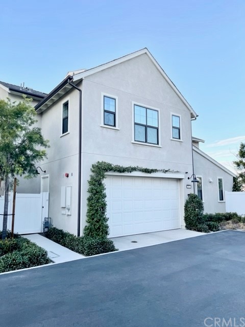 12 Vasto Street Rancho Mission Viejo, CA 92694 - Photo 1 of 1 a front view of a house with a yard and garage