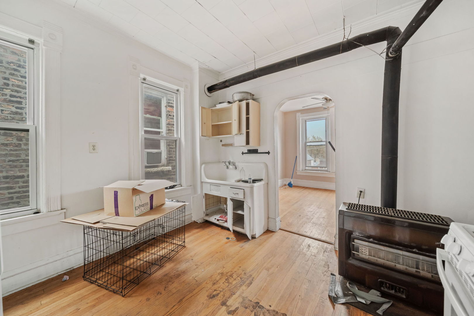 2236 West 19th Street Chicago, IL 60608 - Photo 23 of 40 a living room with furniture and a wooden floor
