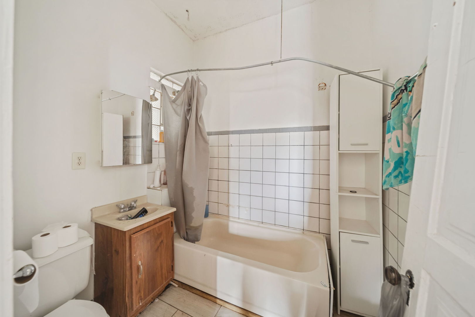 2236 West 19th Street Chicago, IL 60608 - Photo 28 of 40 a bathroom with a sink a toilet and shower