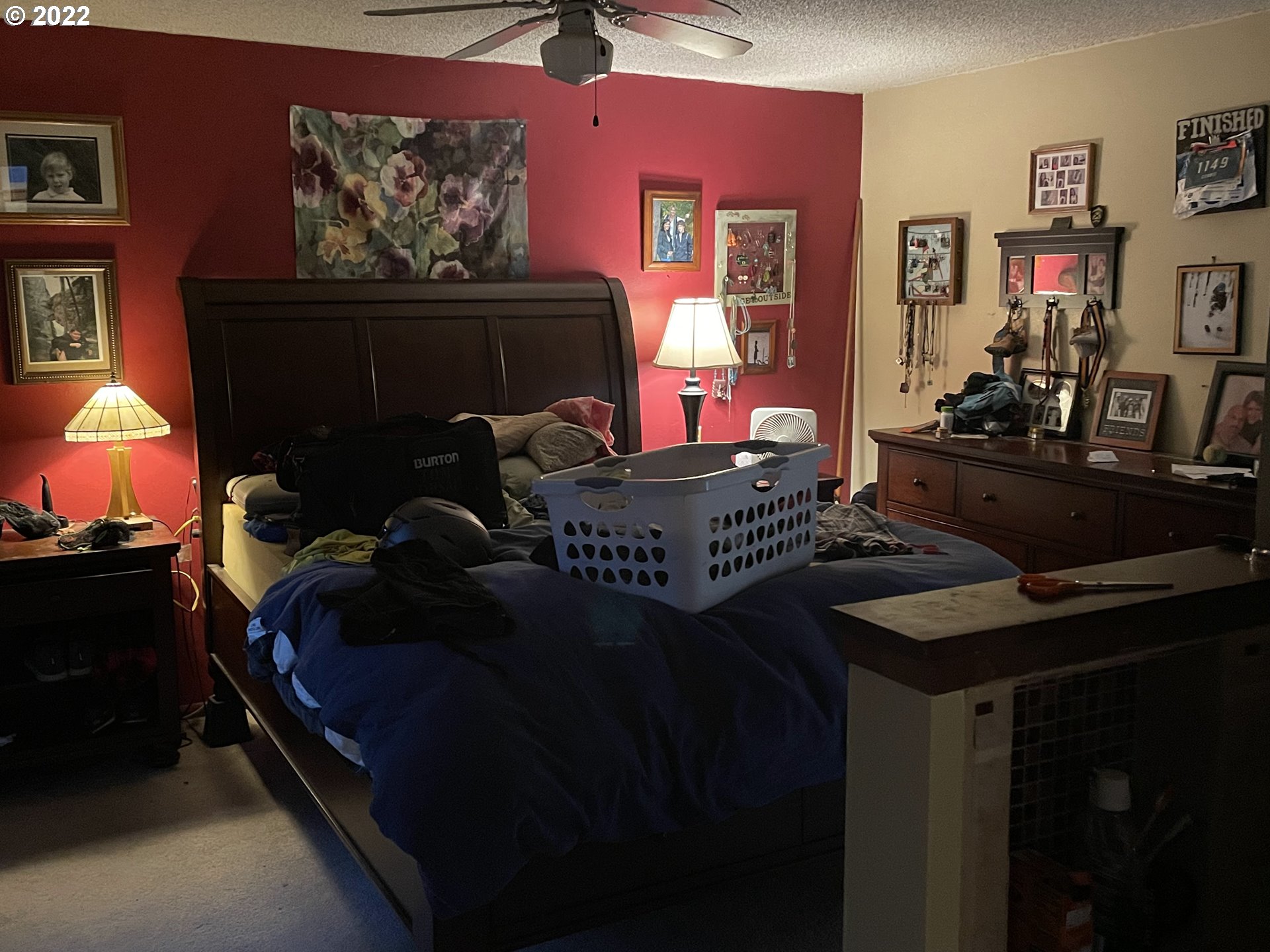 541 Hamilton Street Springfield, OR 97477 - Photo 4 of 15 a bedroom with a bed and a lamp on dresser