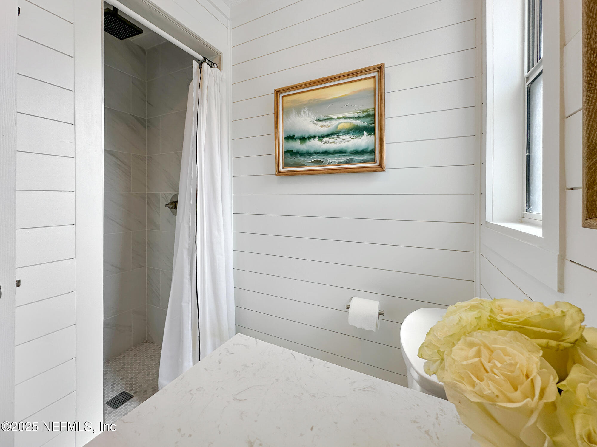 452 Sargo Road Atlantic Beach, FL 32233 - Photo 39 of 74 a bathroom with a bathtub and shower