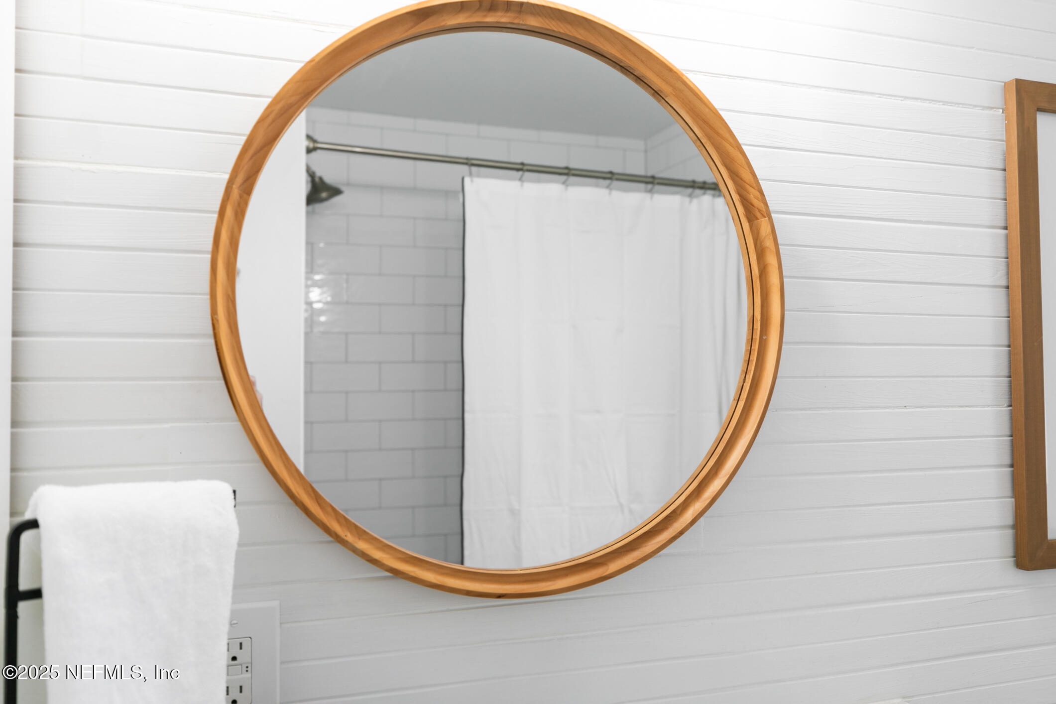 452 Sargo Road Atlantic Beach, FL 32233 - Photo 48 of 74 a view of a mirror in a bathroom
