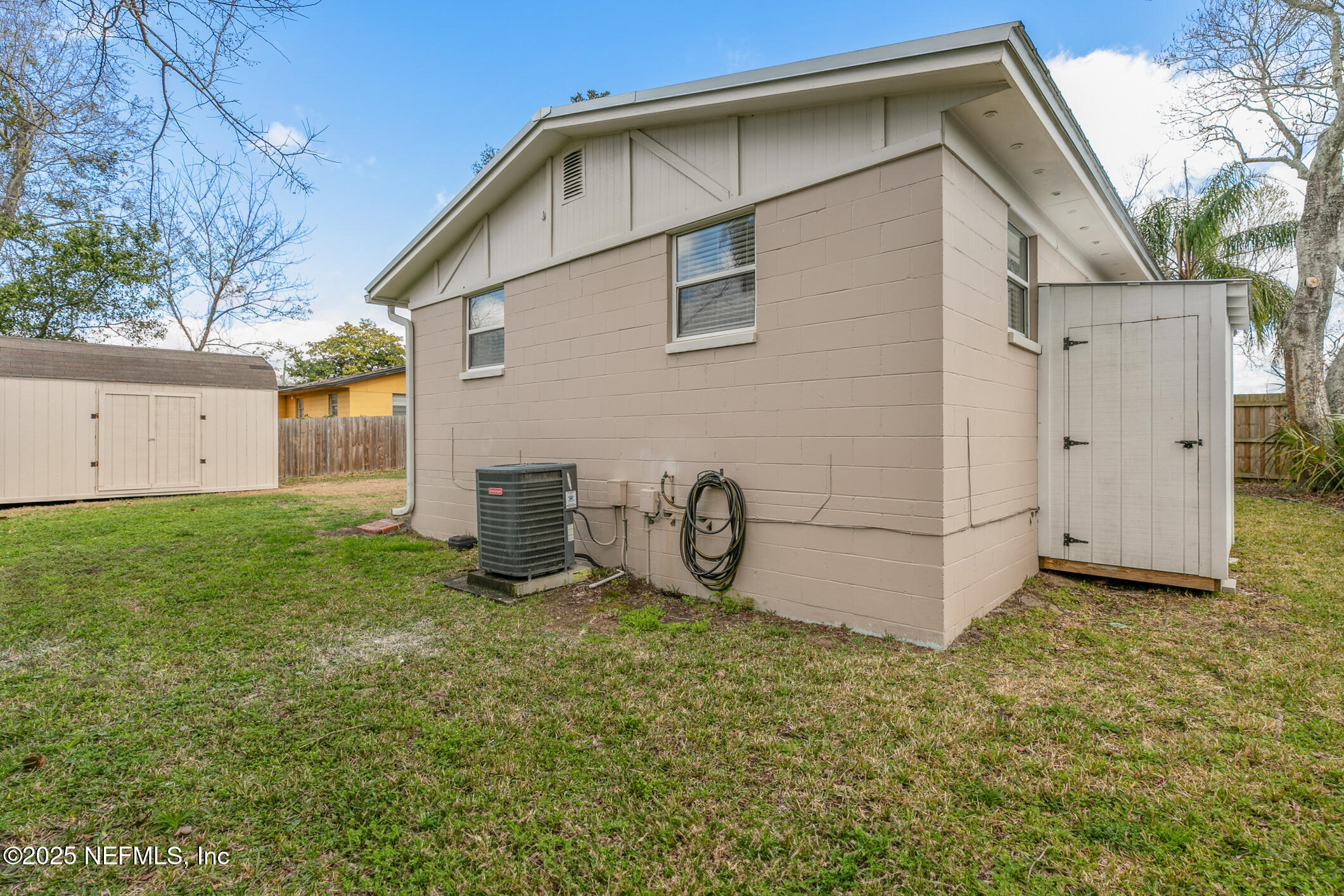 452 Sargo Road Atlantic Beach, FL 32233 - Photo 57 of 74 a view of a house with backyard