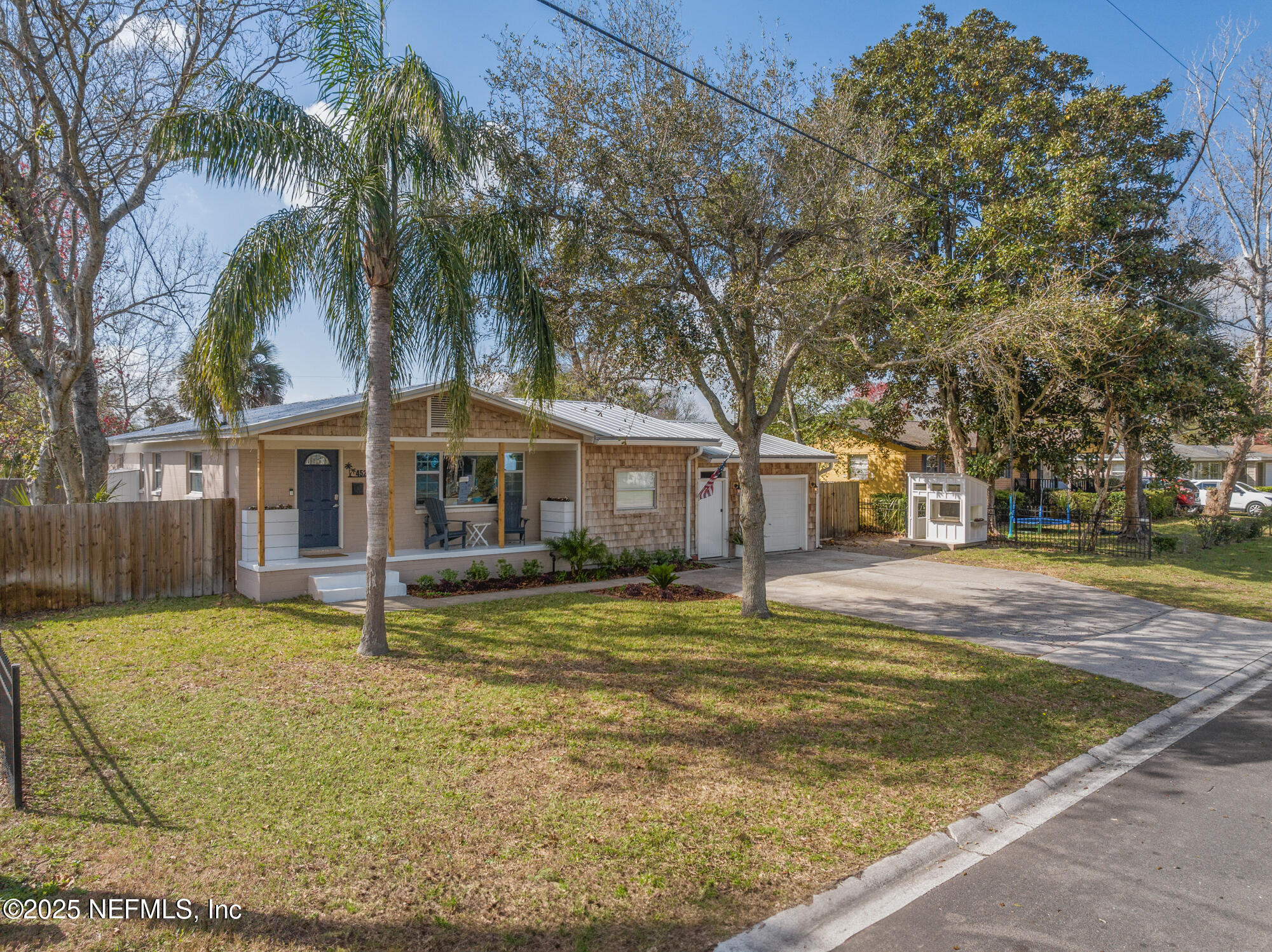 452 Sargo Road Atlantic Beach, FL 32233 - Photo 59 of 74 a view of a house with a swimming pool