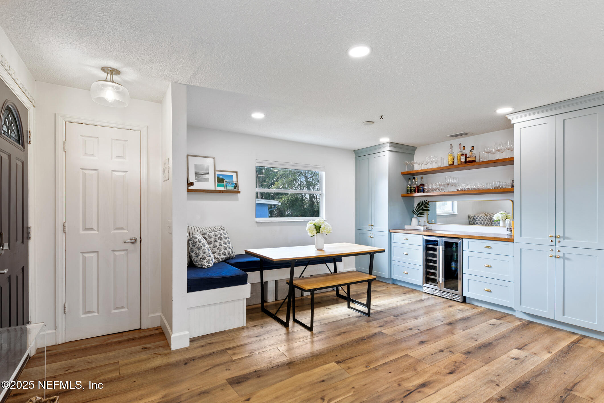 452 Sargo Road Atlantic Beach, FL 32233 - Photo 8 of 74 a workspace with wooden floor and a window