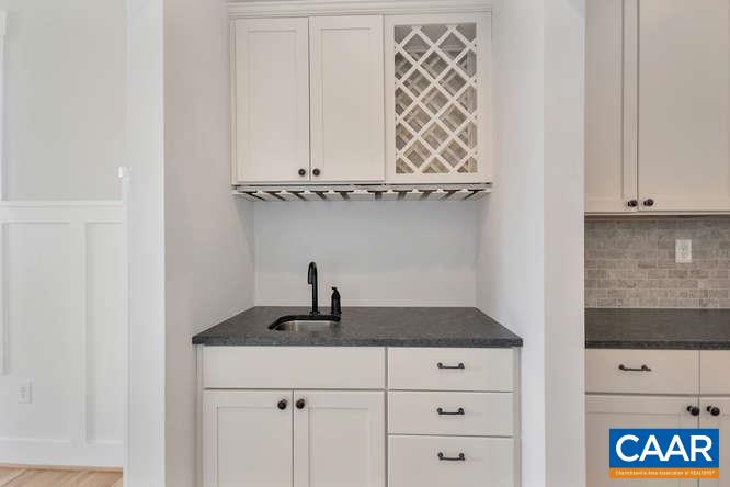 128 Wexford Ridge Road Ruckersville, VA 22968 - Photo 11 of 19 a kitchen with a sink and cabinets
