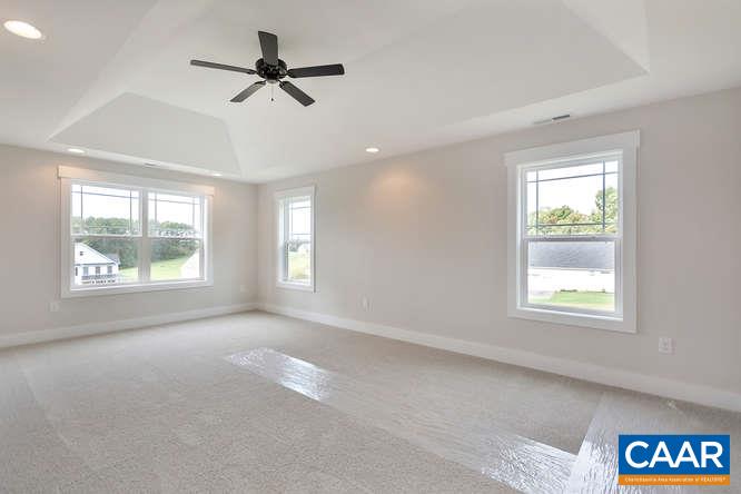 128 Wexford Ridge Road Ruckersville, VA 22968 - Photo 16 of 19 a view of an empty room with a window