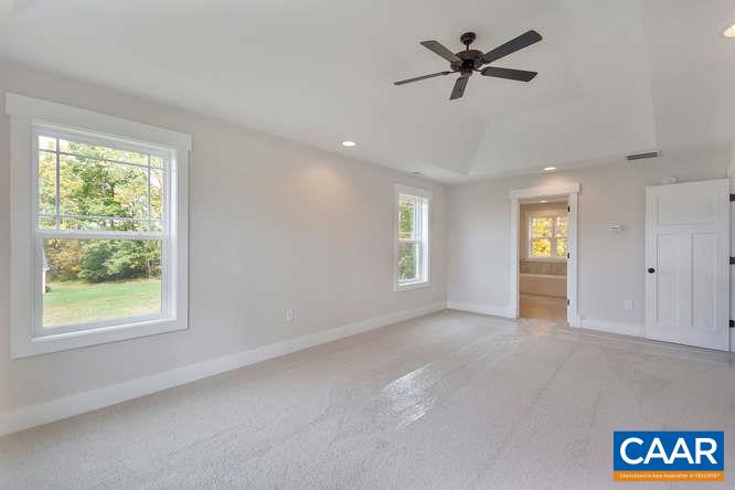 128 Wexford Ridge Road Ruckersville, VA 22968 - Photo 17 of 19 a view of an empty room with a window