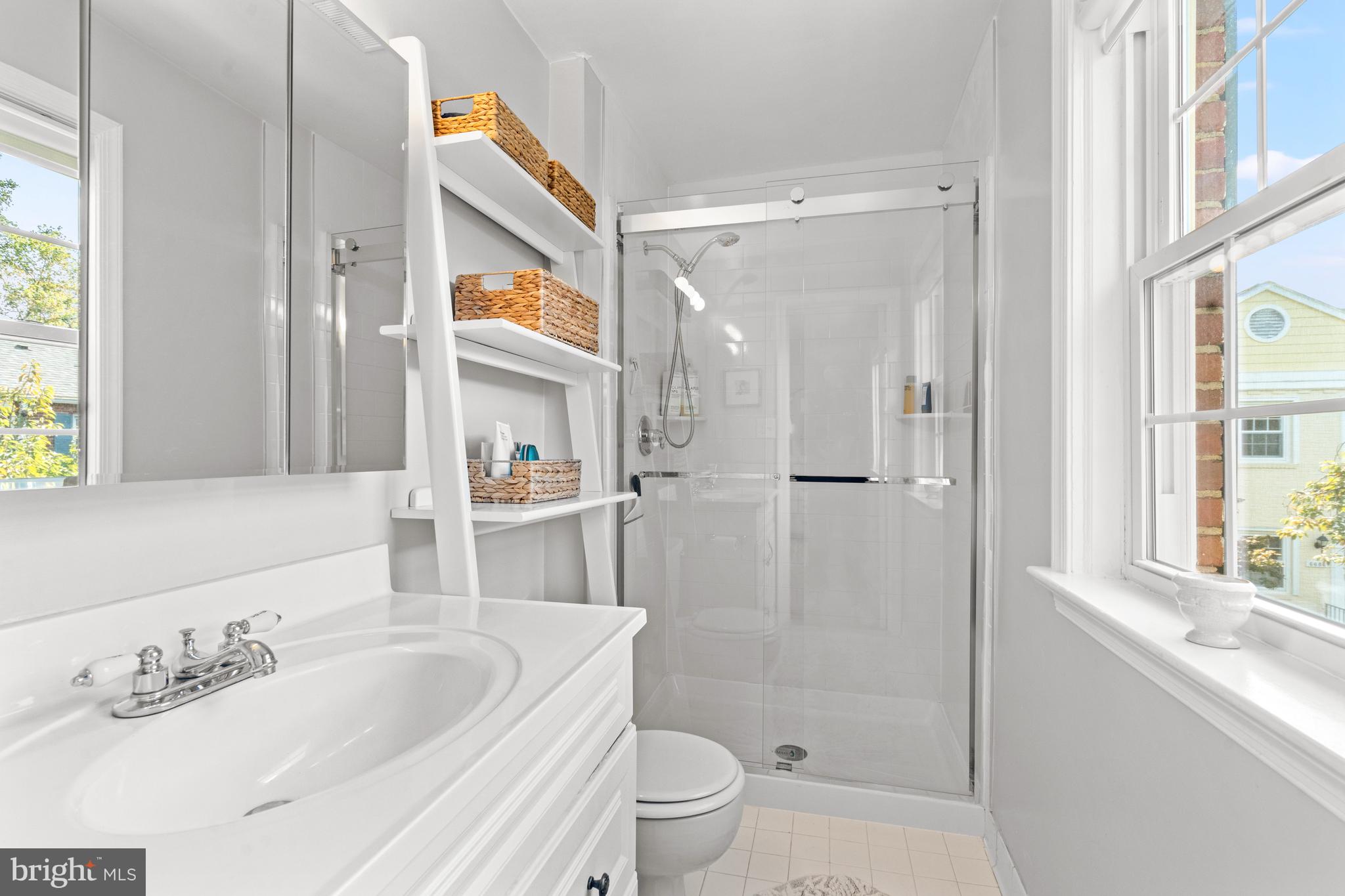 6691 Fairfax Road, Unit 80 Chevy Chase, MD 20815 - Photo 12 of 22 Primary En-Suite Bath with Walk In Shower