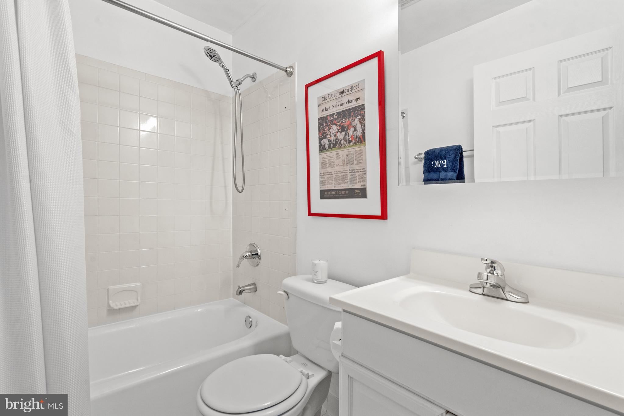6691 Fairfax Road, Unit 80 Chevy Chase, MD 20815 - Photo 18 of 22 Full Hallway Bath with Tub
