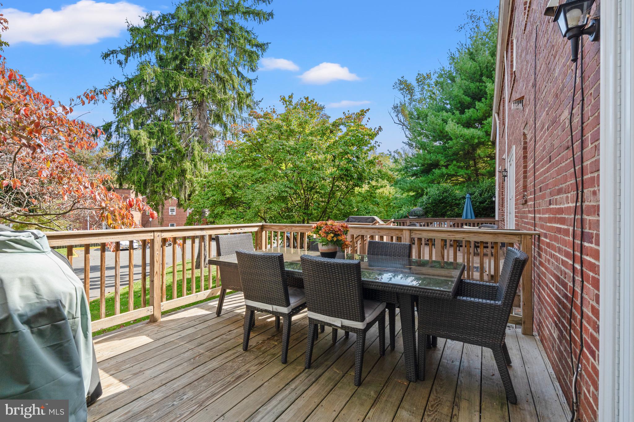 6691 Fairfax Road, Unit 80 Chevy Chase, MD 20815 - Photo 20 of 22 Expansive Private Deck Accessed through Dining
