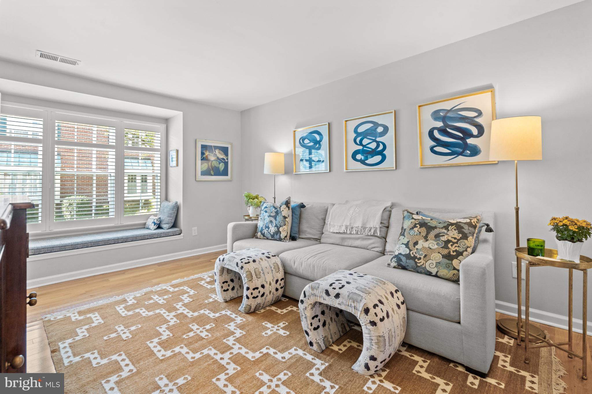 6691 Fairfax Road, Unit 80 Chevy Chase, MD 20815 - Photo 4 of 22 Sun-filled Living Room with Window Seat