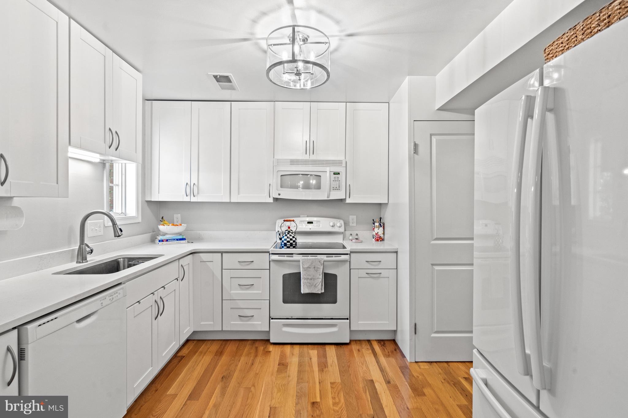 6691 Fairfax Road, Unit 80 Chevy Chase, MD 20815 - Photo 7 of 22 Gleaming Kitchen off Dining Room