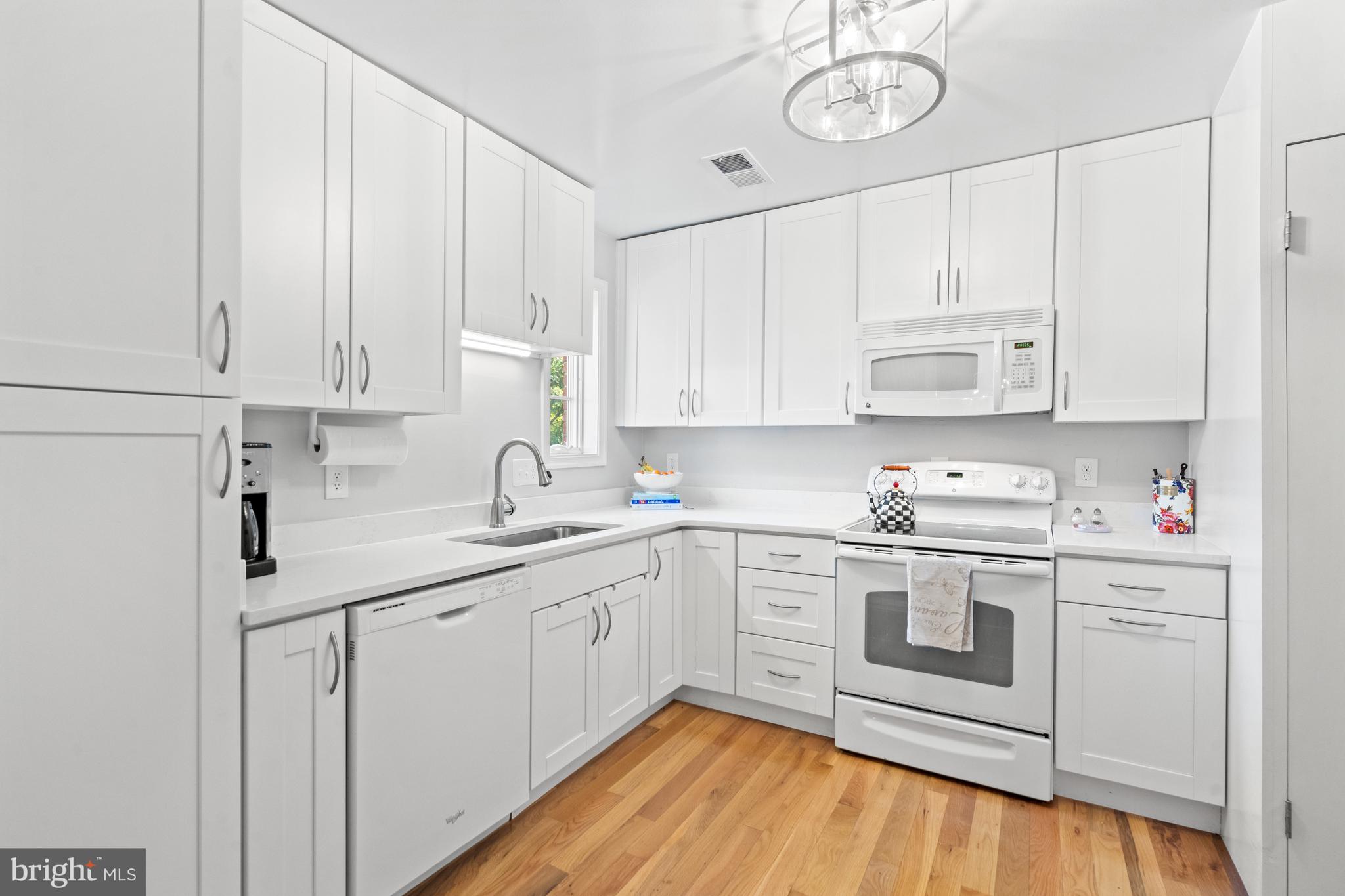 6691 Fairfax Road, Unit 80 Chevy Chase, MD 20815 - Photo 8 of 22 Gleaming Kitchen with Updated Appliances