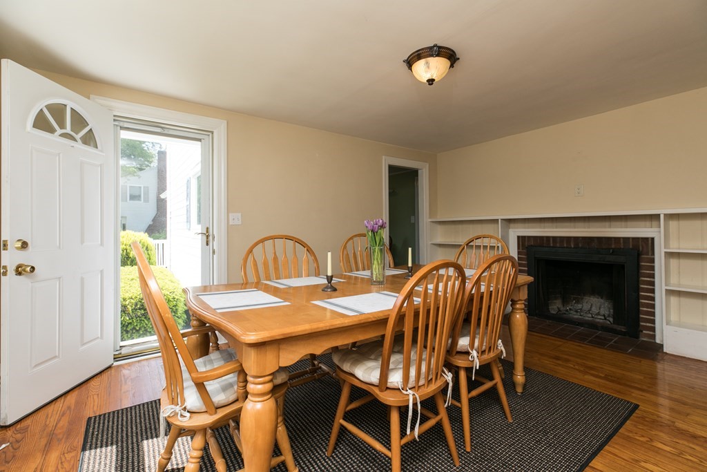 28 Norman Road Hamilton, MA 01982 - Photo 3 of 19 a dining room with furniture and wooden floor