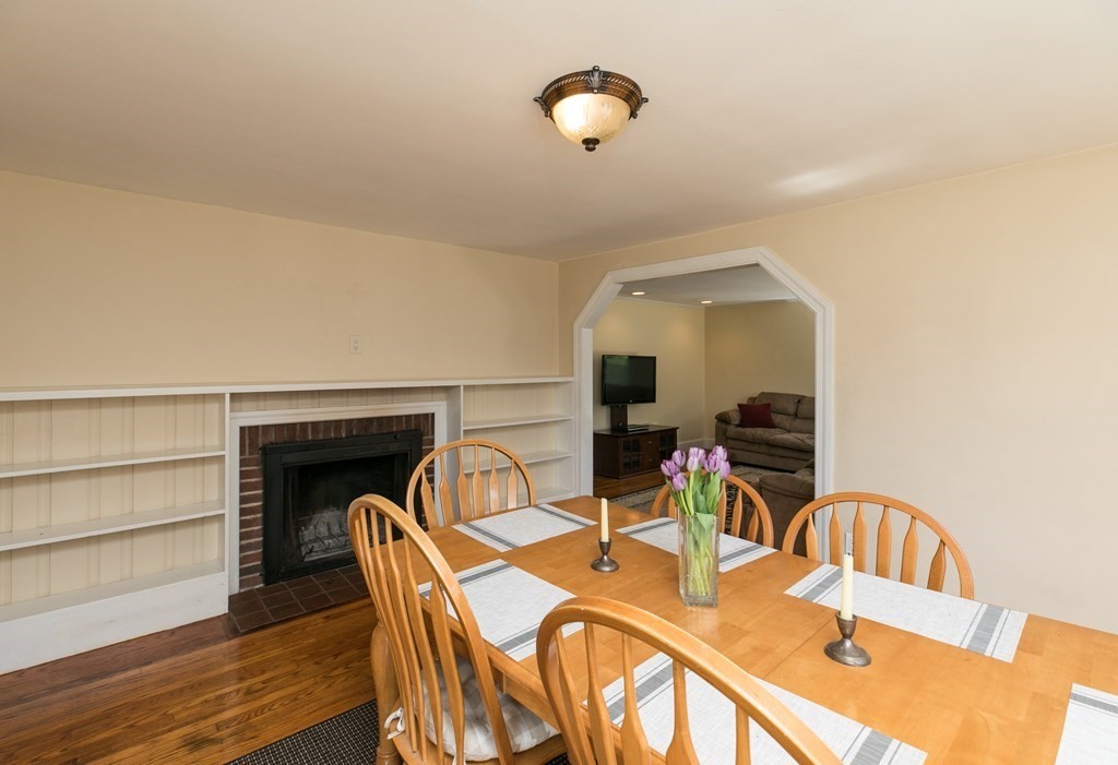 28 Norman Road Hamilton, MA 01982 - Photo 4 of 19 a dining room with furniture and wooden floor