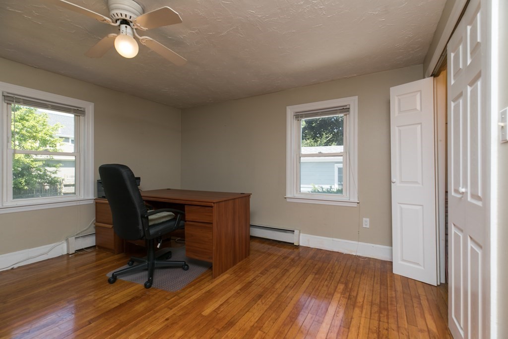 28 Norman Road Hamilton, MA 01982 - Photo 6 of 19 a view of a workspace with furniture and a window