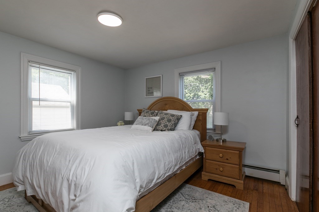 28 Norman Road Hamilton, MA 01982 - Photo 9 of 19 a bedroom with a bed and a window