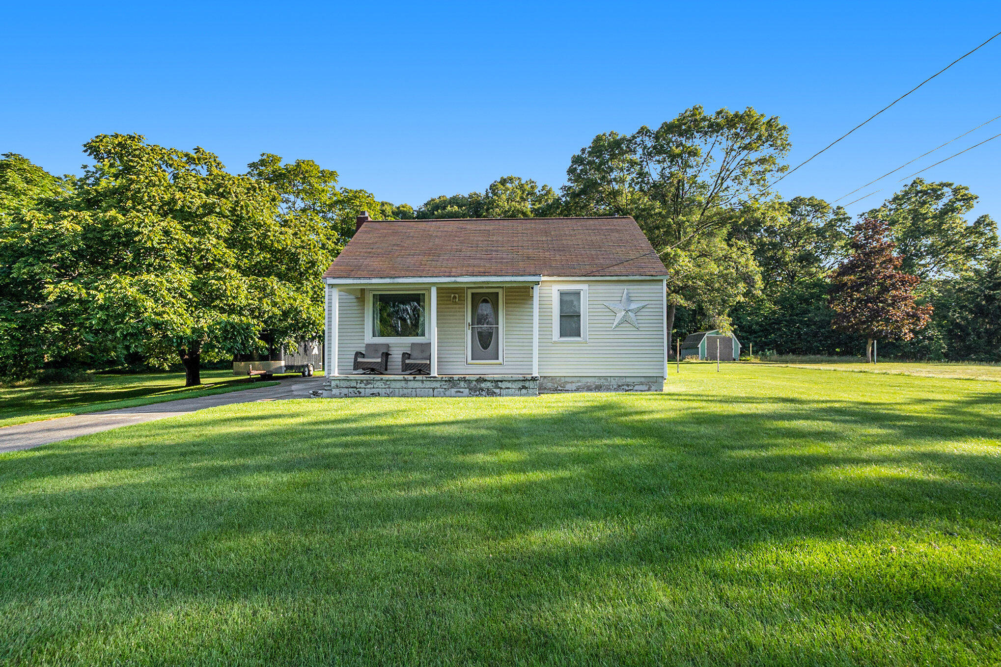 1668 Fenner Road Muskegon, MI 49445 - Photo 3 of 16 003__42a2077_456
