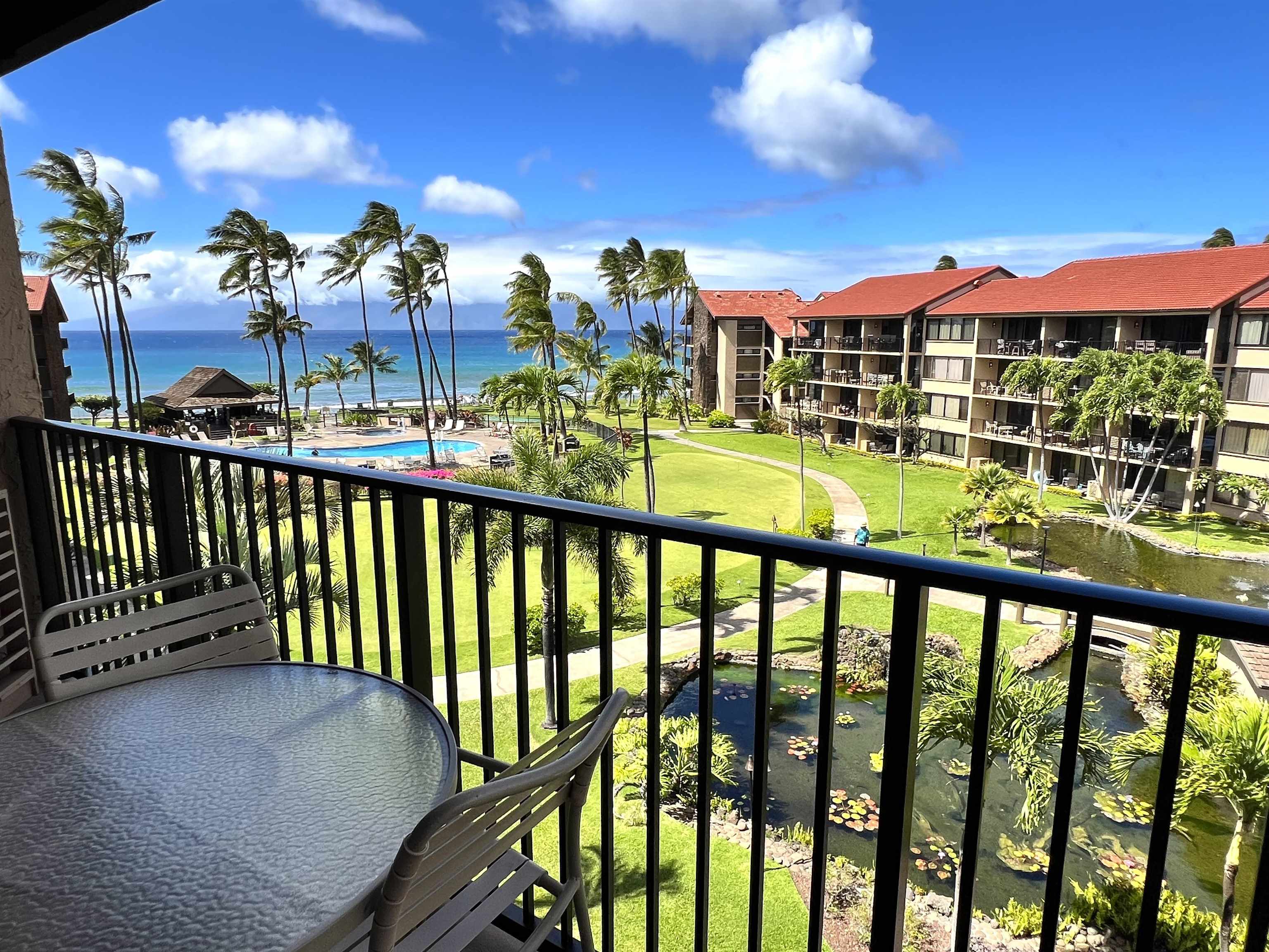 3543 Lower Honoapiilani Road, Unit J403 Lahaina, HI 96761 - Photo 18 of 23 a view of a balcony with a patio
