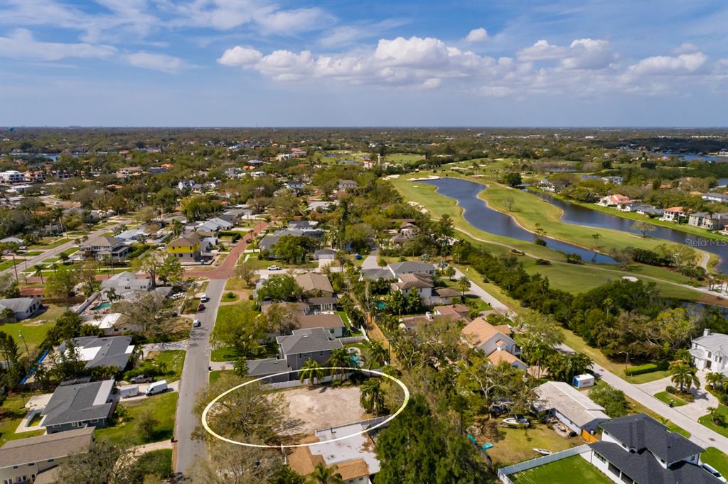 446 Rafael Boulevard Northeast St. Petersburg, FL 33704 - Photo 19 of 20 an aerial view of residential houses with outdoor space and trees