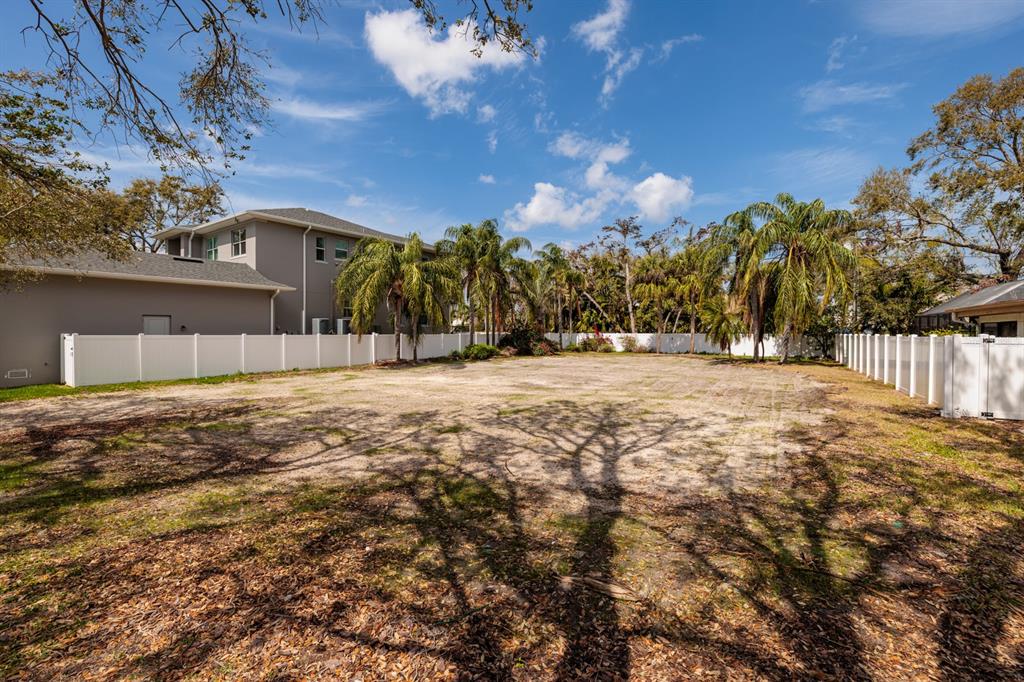 446 Rafael Boulevard Northeast St. Petersburg, FL 33704 - Photo 3 of 20 a view of road with large trees
