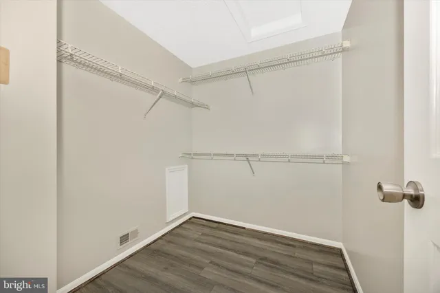 a view of an empty walk in closet