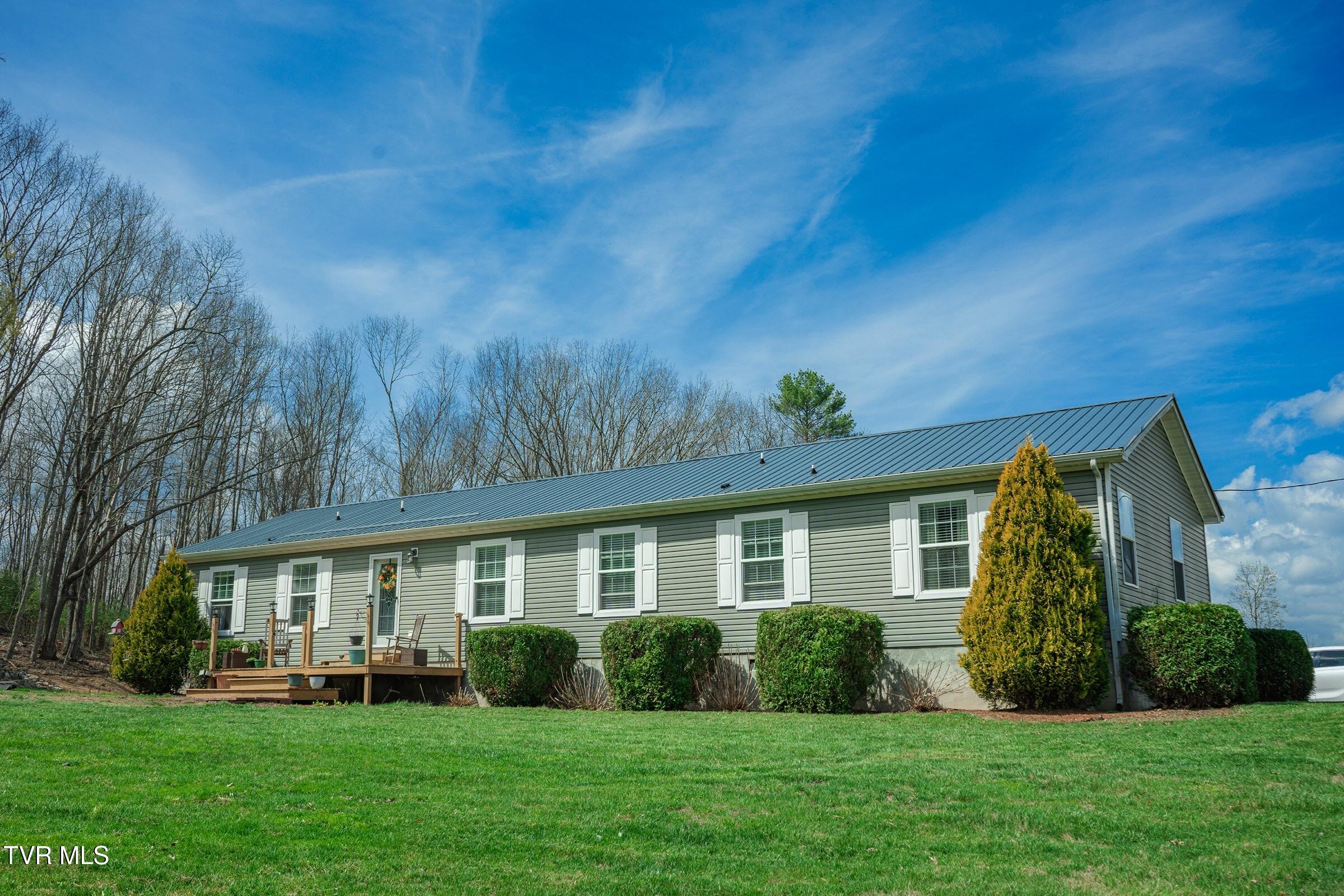 1144 Myrtle Drive Butler, TN 37640 - Photo 1 of 36 Front house-compressed