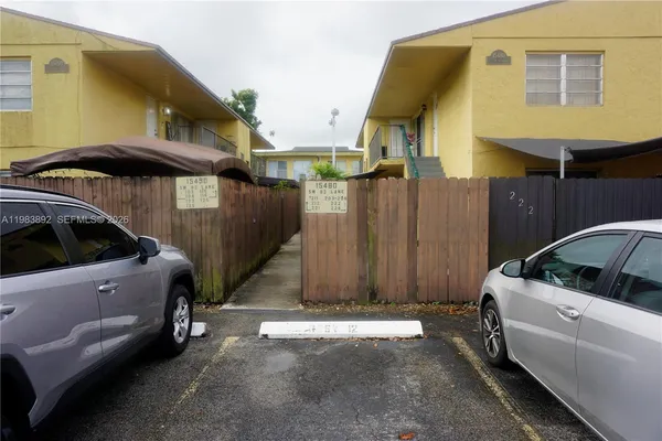 a view of a car park in front of a building