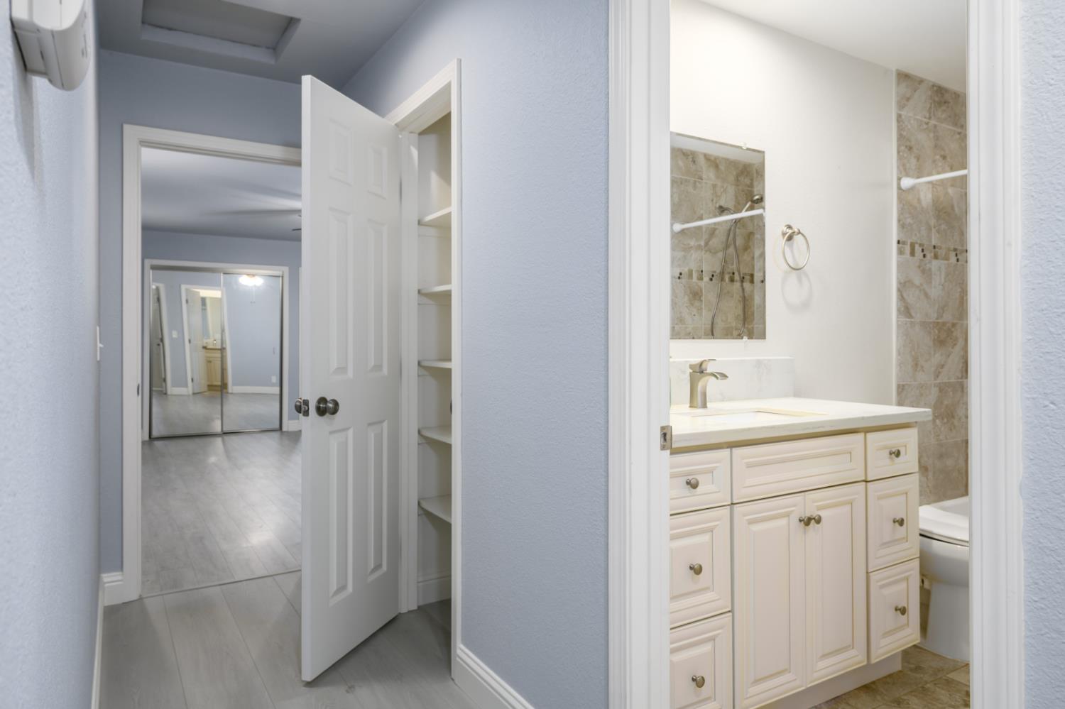 2873 Anderson Way Placerville, CA 95667 - Photo 16 of 24 a bathroom with a sink and a mirror