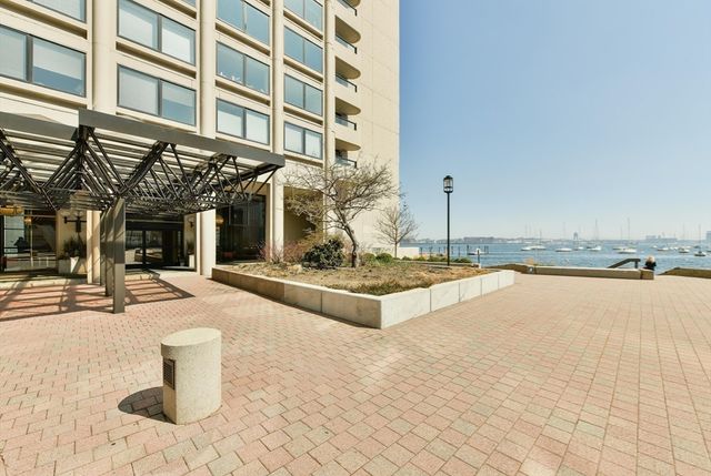 a view of a building with swimming pool