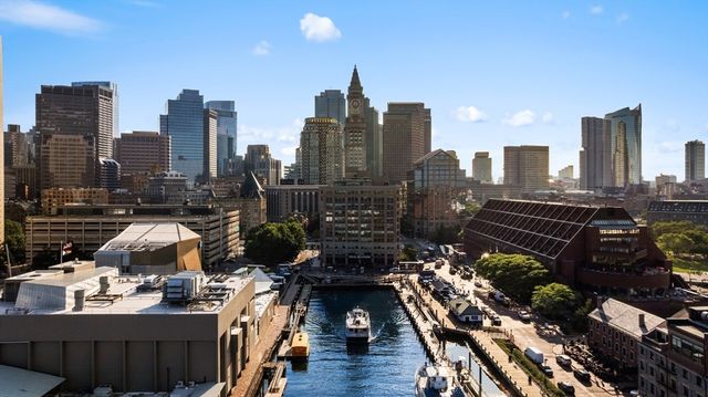 a view of a city with tall buildings