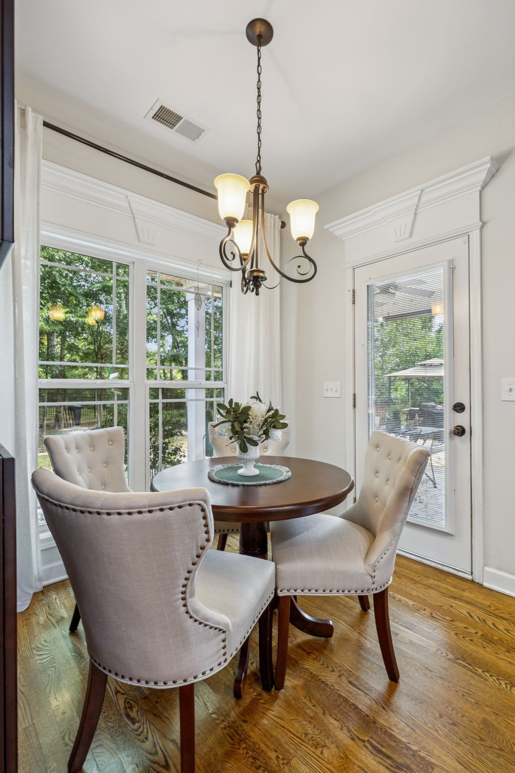 323 Amazonway Ridge Murfreesboro, TN 37130 - Photo 12 of 41 a view of a dining room with furniture window and wooden floor