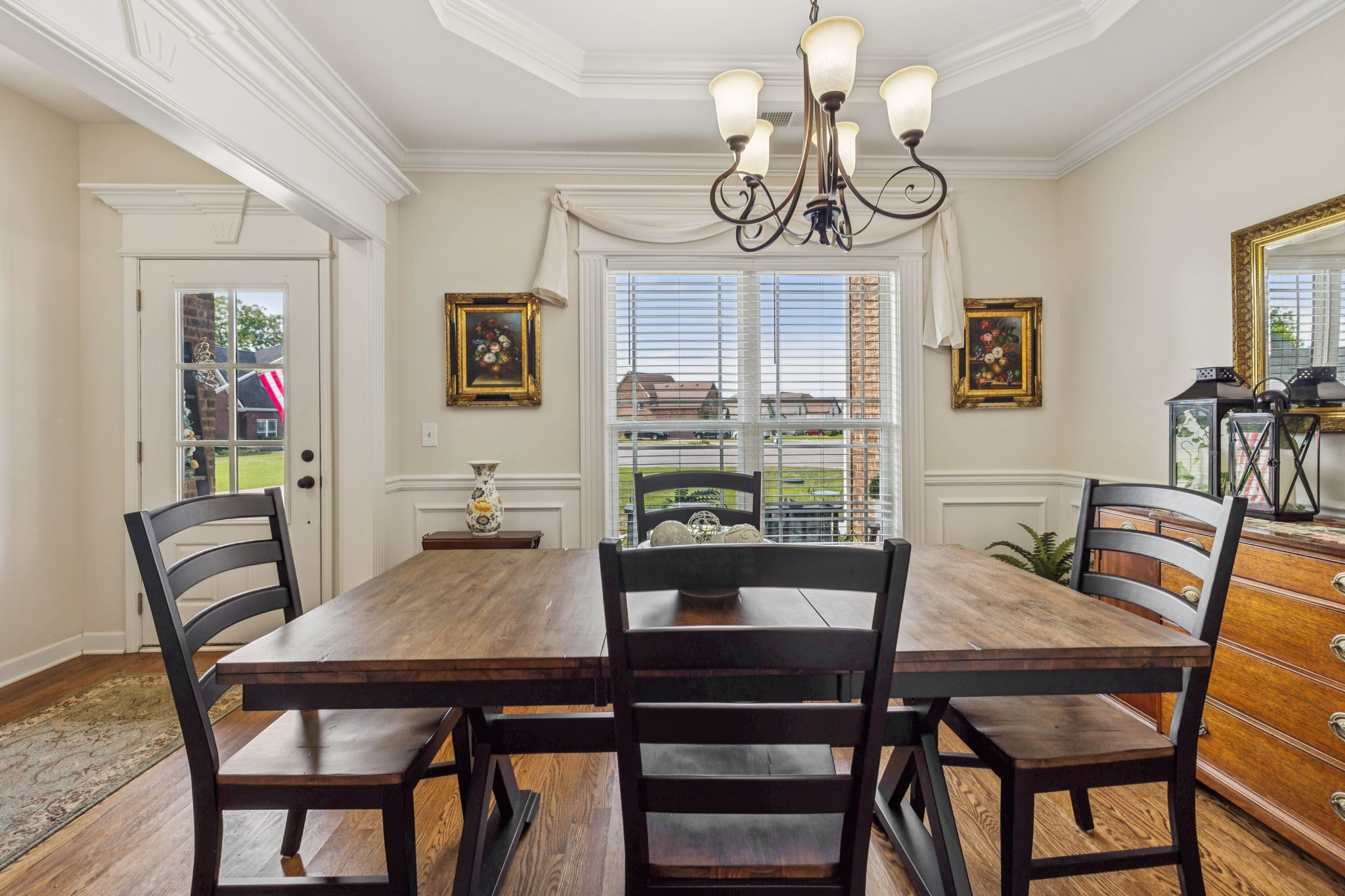 323 Amazonway Ridge Murfreesboro, TN 37130 - Photo 14 of 41 a view of a dining room with furniture a chandelier and wooden floor
