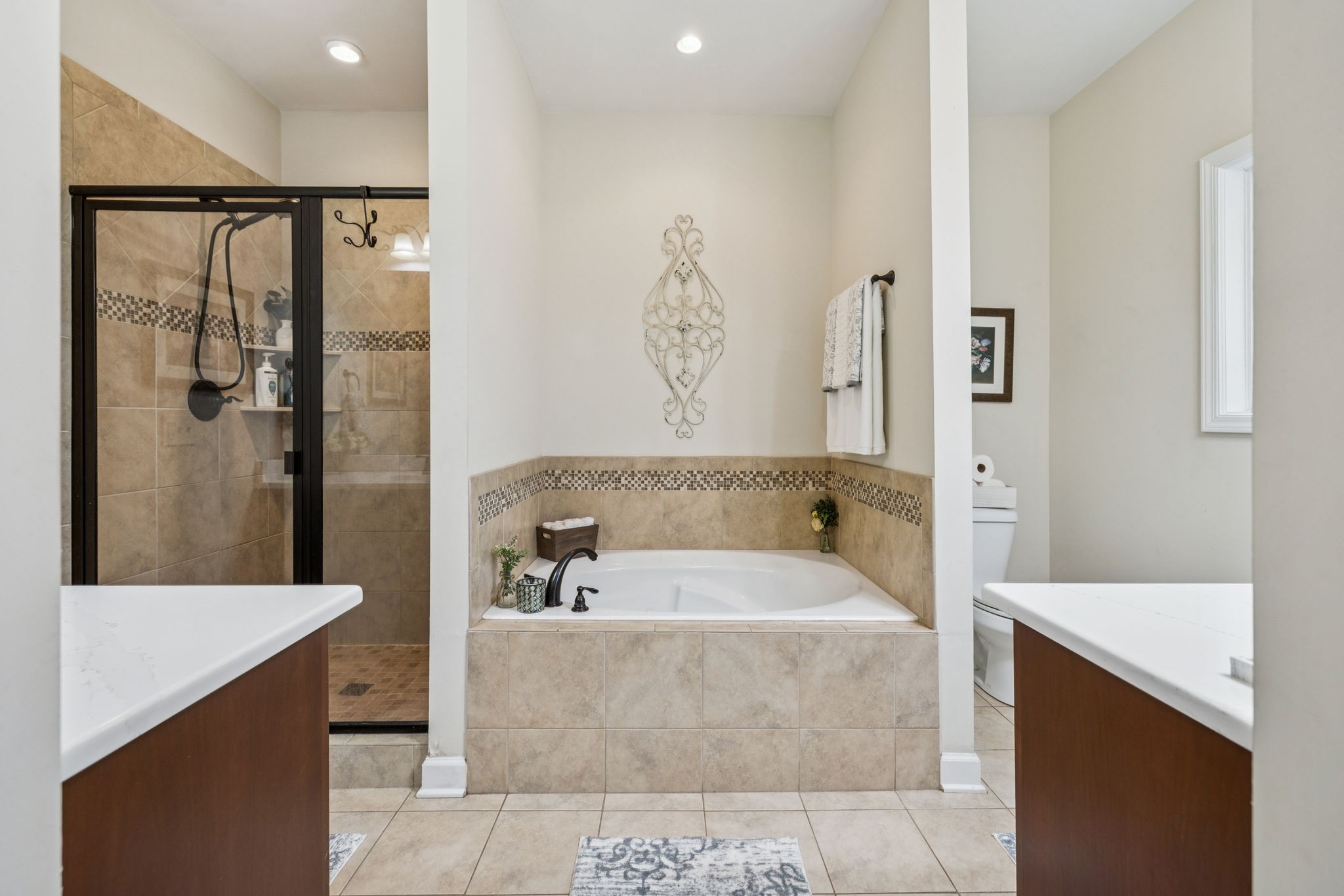 323 Amazonway Ridge Murfreesboro, TN 37130 - Photo 18 of 41 a bathroom with a tub a sink and a large mirror