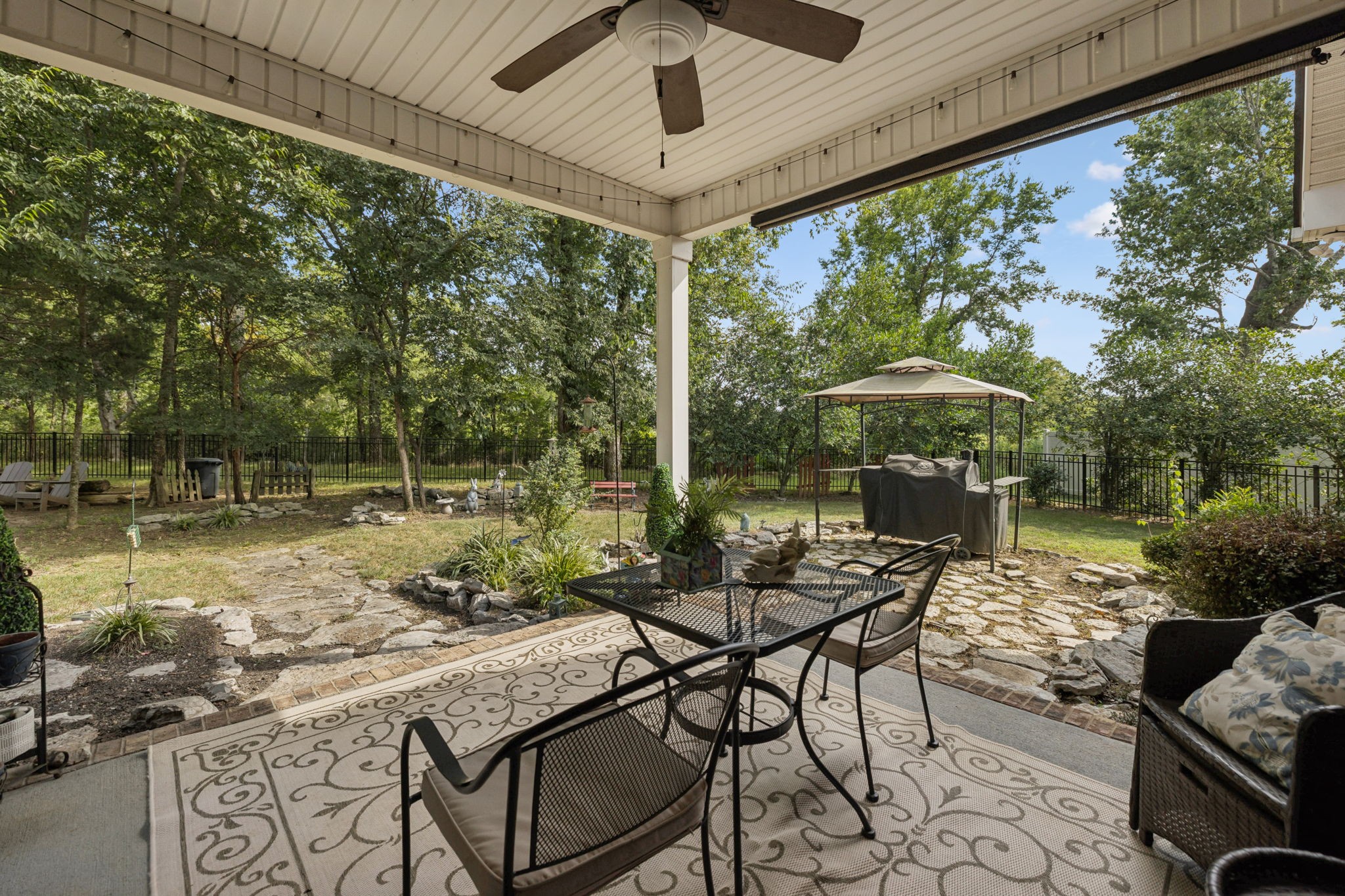 323 Amazonway Ridge Murfreesboro, TN 37130 - Photo 33 of 41 a patio with yard glass top table and chairs
