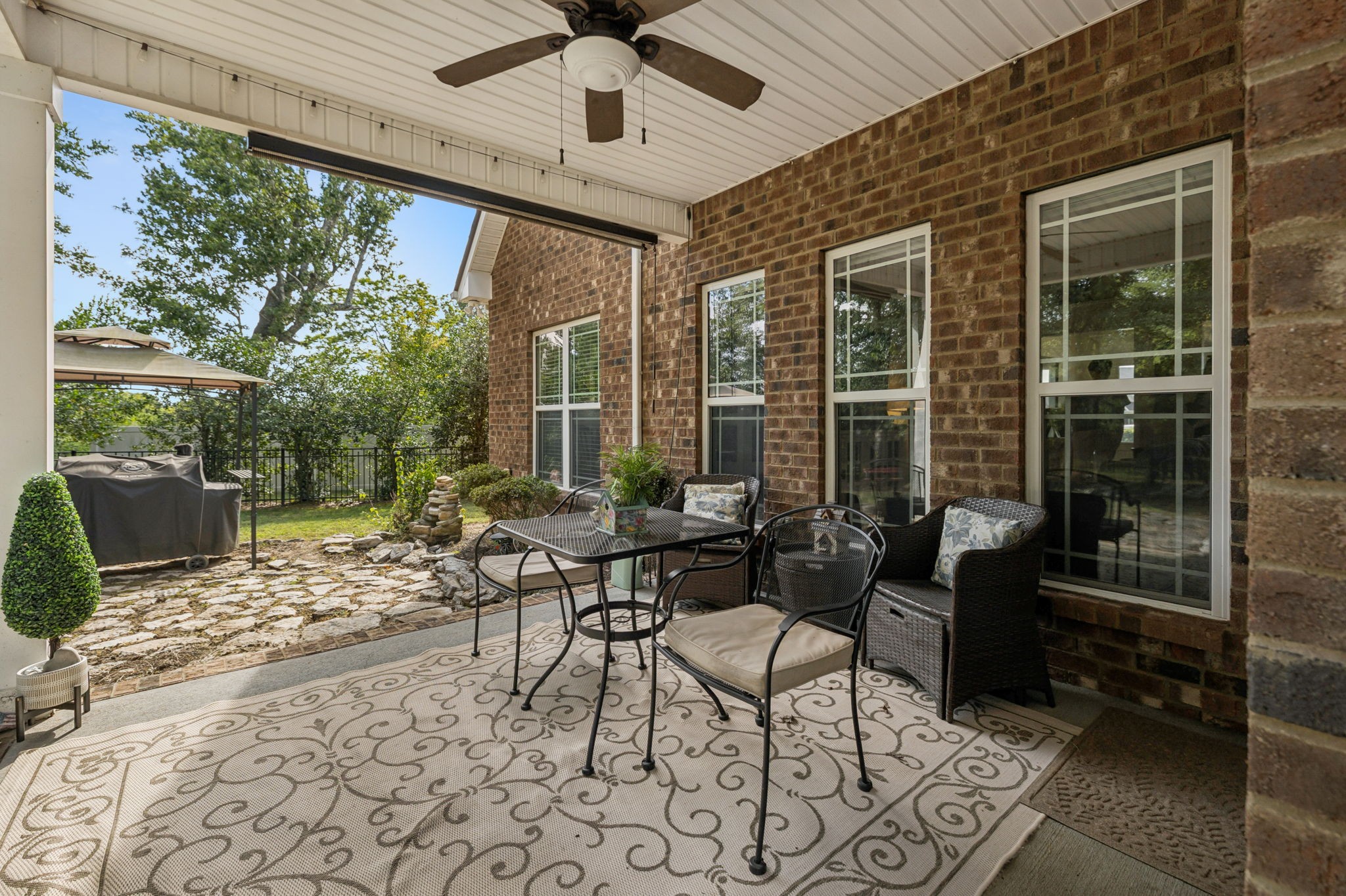 323 Amazonway Ridge Murfreesboro, TN 37130 - Photo 34 of 41 a outdoor space with patio the couches and a dining table with garden view