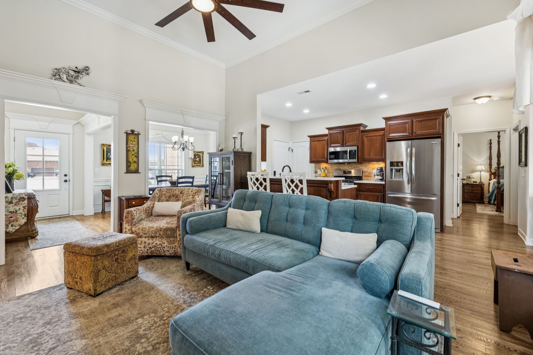 323 Amazonway Ridge Murfreesboro, TN 37130 - Photo 5 of 41 a living room with furniture kitchen view and a wooden floor