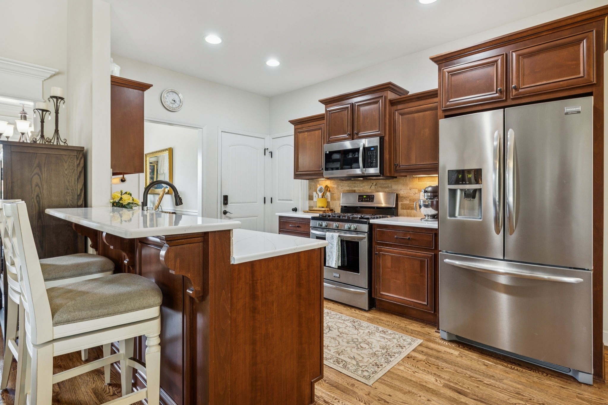 323 Amazonway Ridge Murfreesboro, TN 37130 - Photo 8 of 41 a kitchen with stainless steel appliances granite countertop a refrigerator stove and microwave