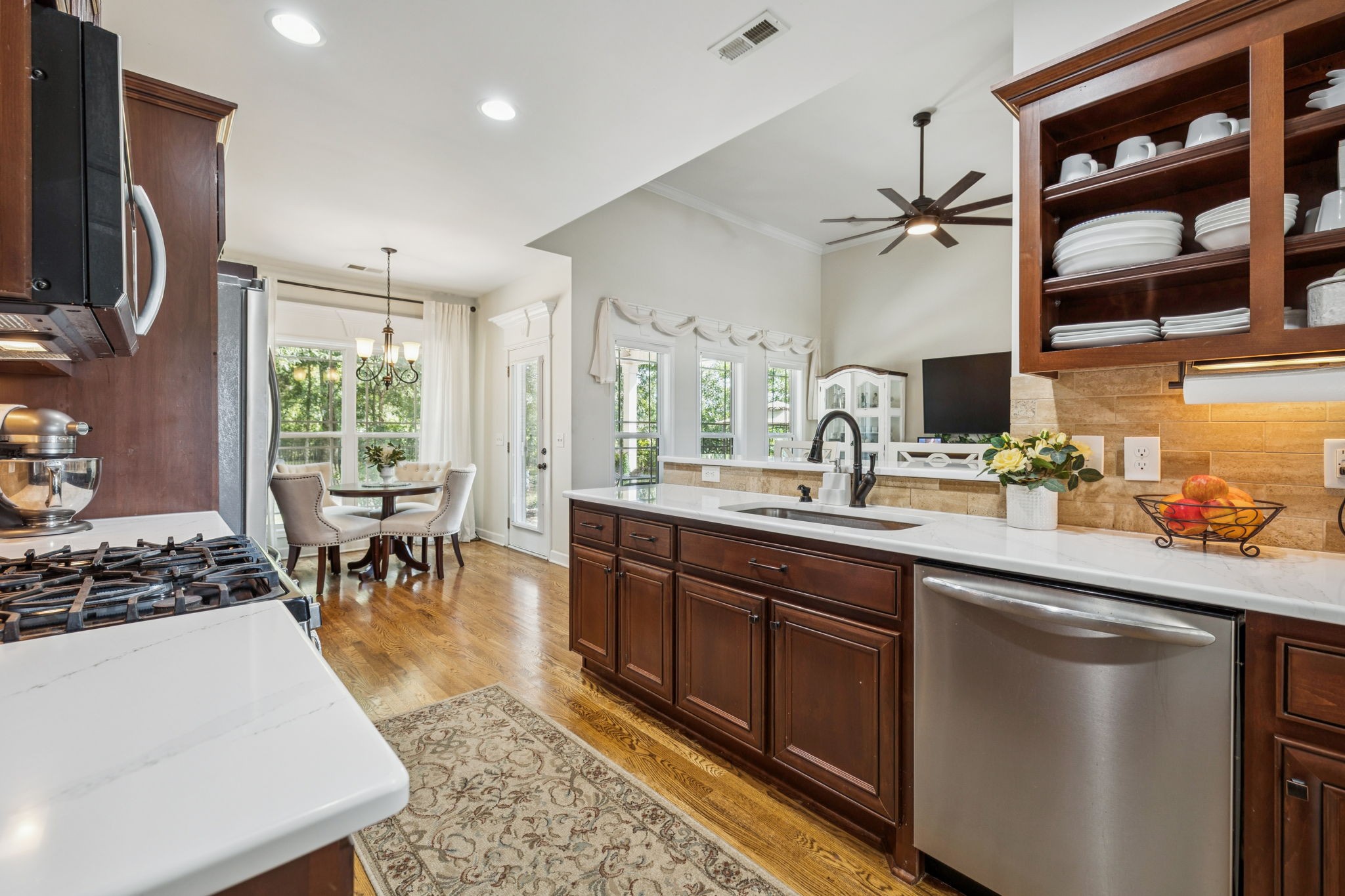 323 Amazonway Ridge Murfreesboro, TN 37130 - Photo 9 of 41 a kitchen with stainless steel appliances granite countertop sink stove and refrigerator