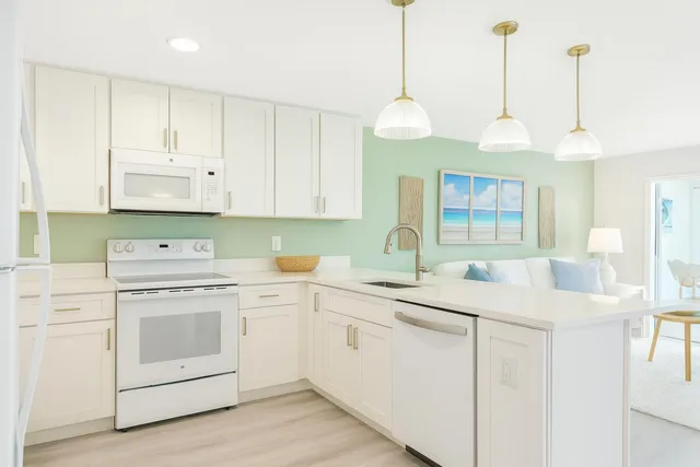 a bedroom with a bed and a lamp