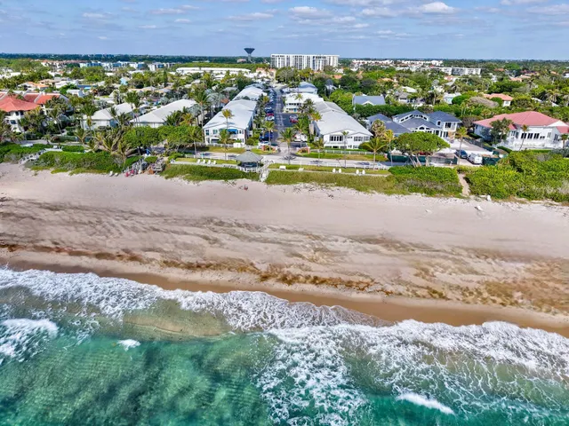 a view of a city with an ocean beach