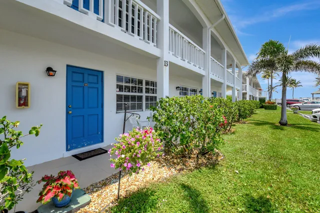 a flower plants in front of a house