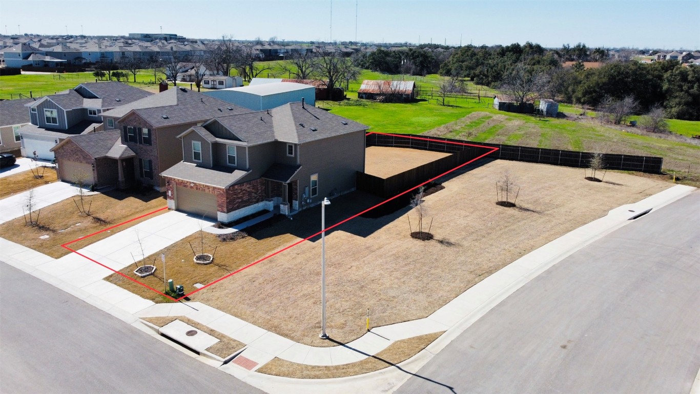 925 Duskywing Way Georgetown, TX 78626 - Photo 24 of 28 Oversized corner lot, with no neighbor to the left and backs to a small ranch