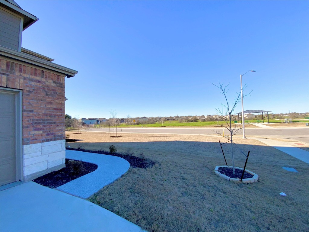 925 Duskywing Way Georgetown, TX 78626 - Photo 28 of 28 Plenty of additional parking next to the home, which sits on a corner lot across from the park and at the dead end of a street so fast driving cars should not be an issue.
