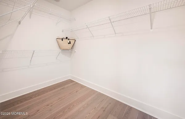 a view of a room with racks on the wall